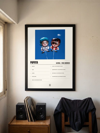 Póster de PAPOTA de CA7RIEL × Paco Amoroso enmarcado en una pared