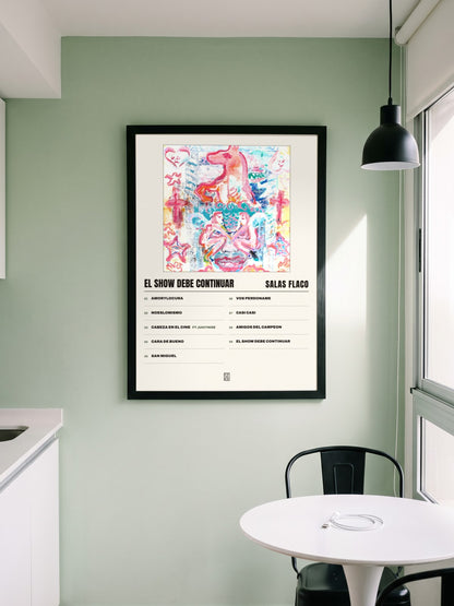 Póster de El Show Debe Continuar de Salas Flaco enmarcado en una pared