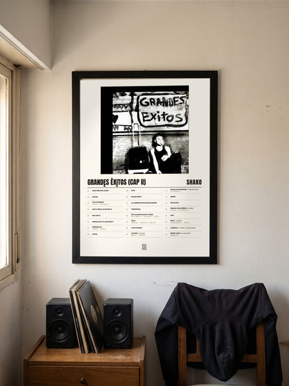Póster de grandęs èxįtos (cap II) de Shako enmarcado en una pared