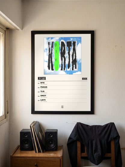 Póster de Korta de Knak enmarcado en una pared